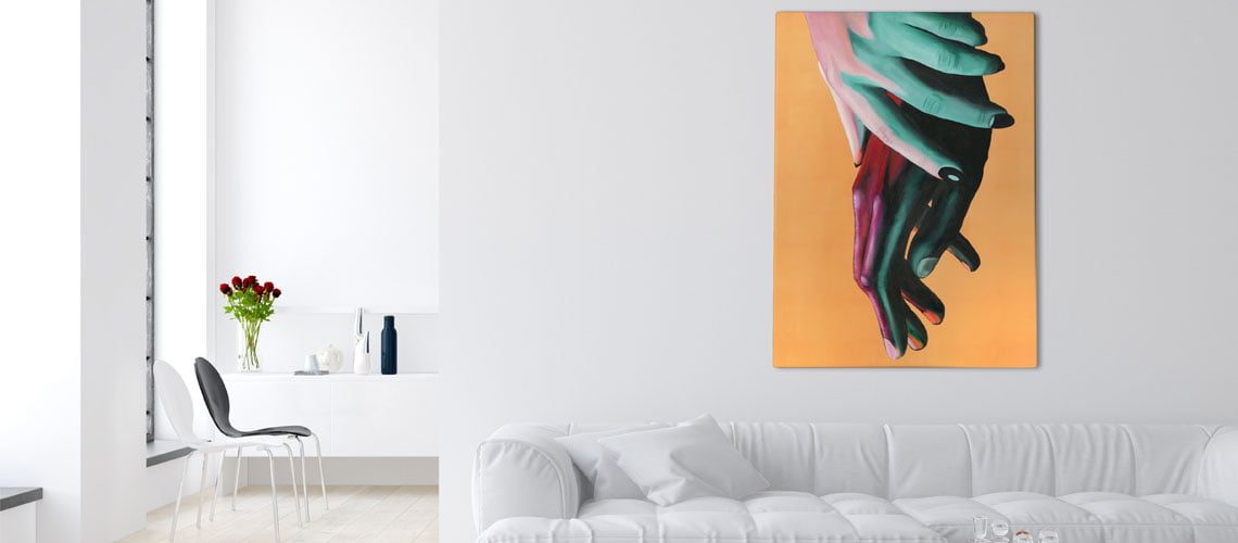 Hands painting on wall